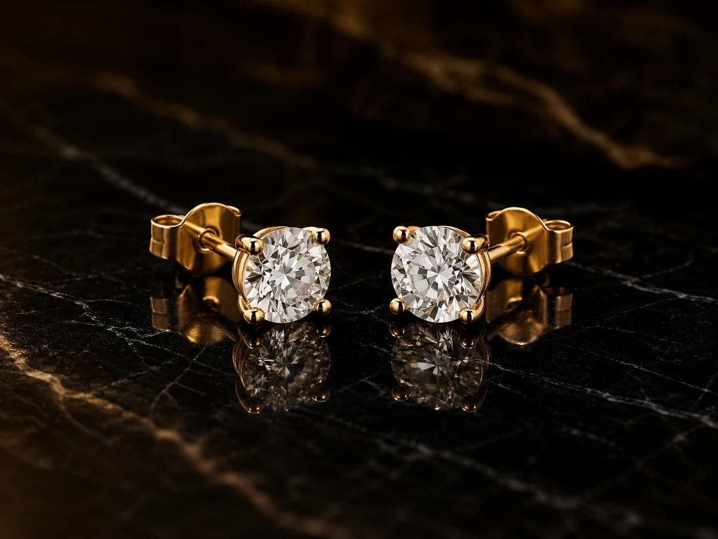 Kolczyki 1.00 ct total 18K żółte złoto